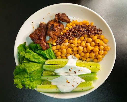 Balanced vibrant meal on a light surface, focusing on natural ingredients